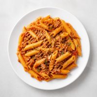 228. Penne Bolognese